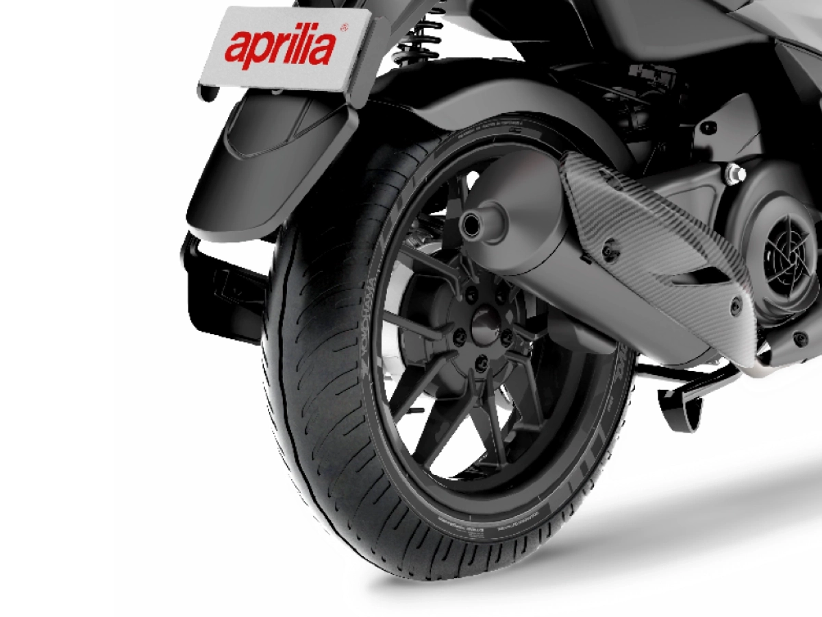 Aprilia SR Storm 125 rear tyre and alloy wheel close up