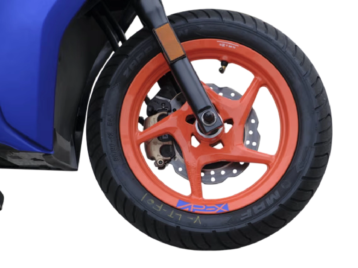 Ather 450 Apex front alloy wheel and disc brake close up
