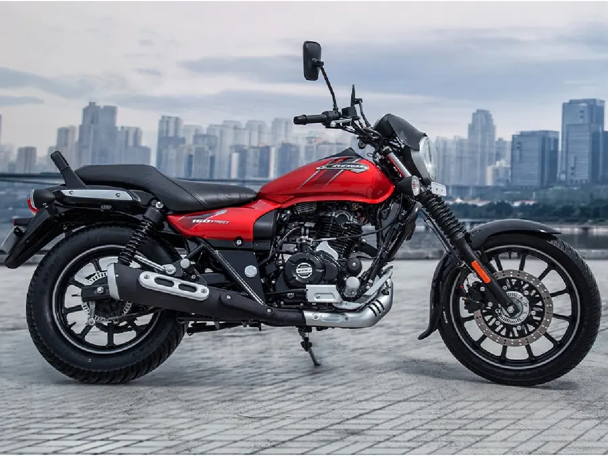 Bajaj Avenger Street 160 red colour parked with city skyline