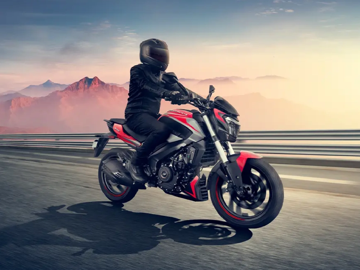 Bajaj Dominar 250 Canyon Red in dynamic highway riding shot