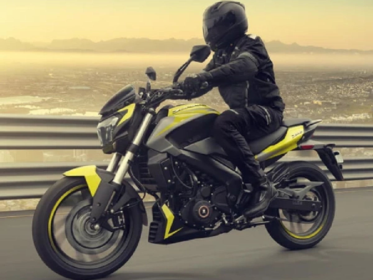 Rider cruising on Bajaj Dominar 250 Citrus Rush on highway