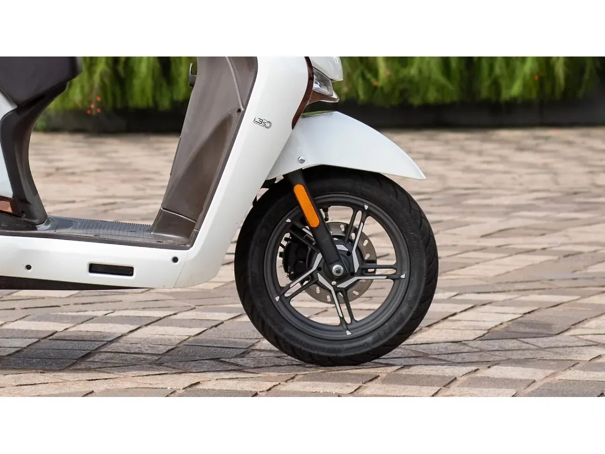 Hero Destini 125 front alloy wheel and tyre detail