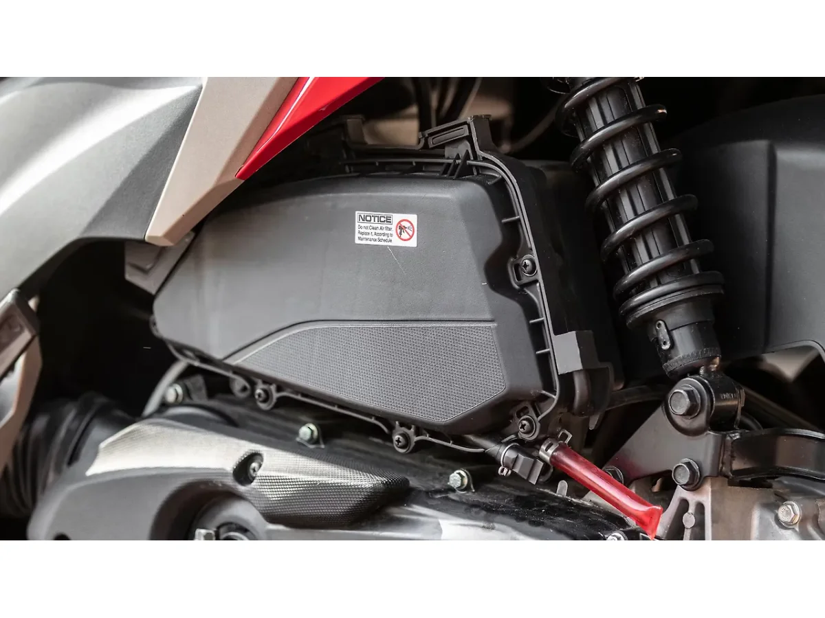 Hero Xoom 125 air cleaner housing and rear suspension detail