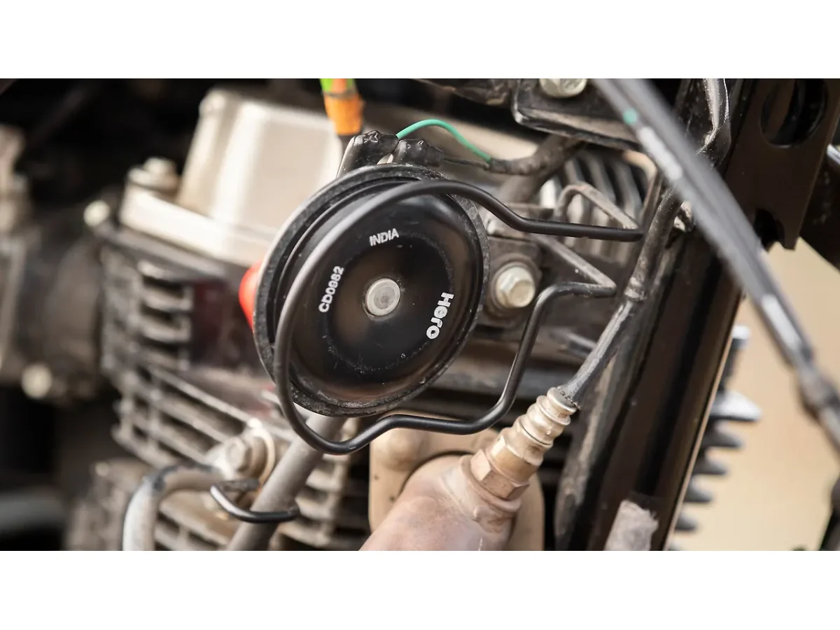 Hero XPulse 200 4V electric horn mounted near the engine frame