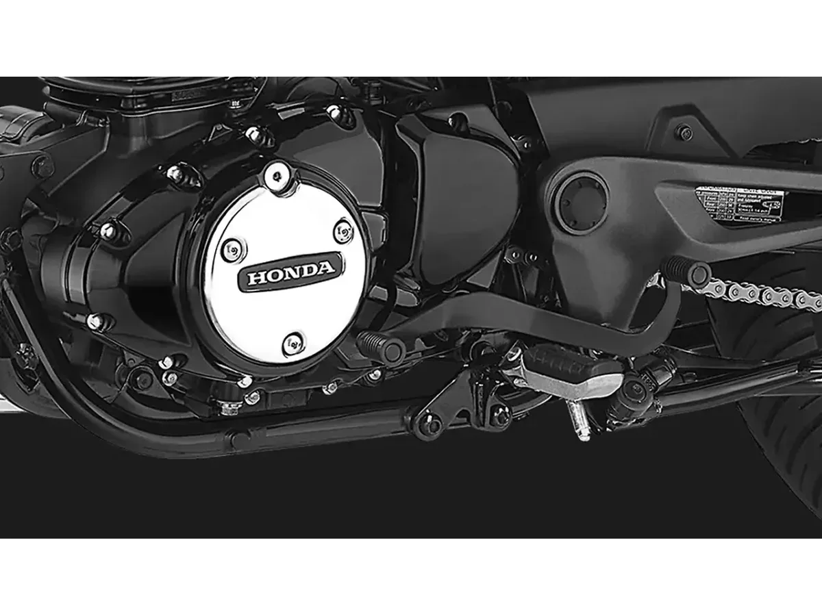 Honda CB350 rider footpeg and engine