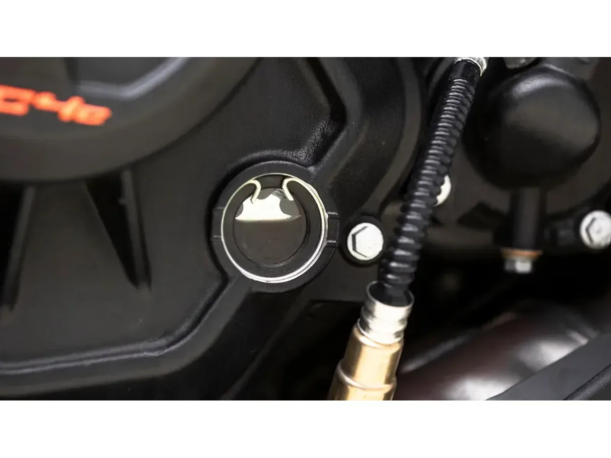 KTM 390 Adventure X engine oil inspection window
