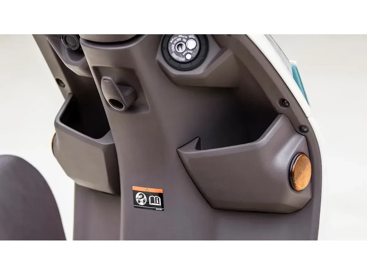 Suzuki Access 125 front storage pocket