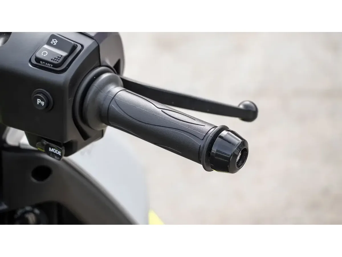 Close-up of the TVS Orbiter handlebar grip and bar-end weight