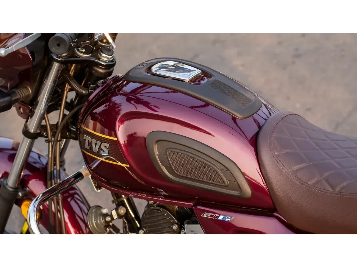 Close-up of the TVS Radeon fuel tank and branding