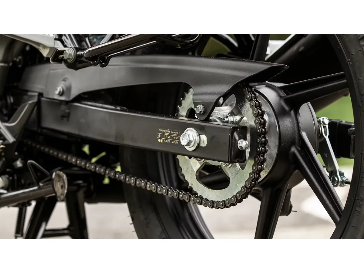 Close-up of the TVS Raider 125 chain and chain cover