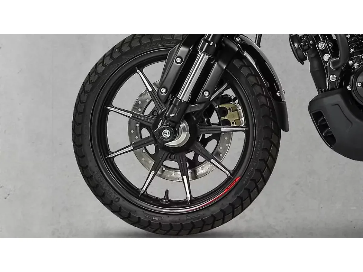 Close-up of the TVS Ronin front wheel and disc brake