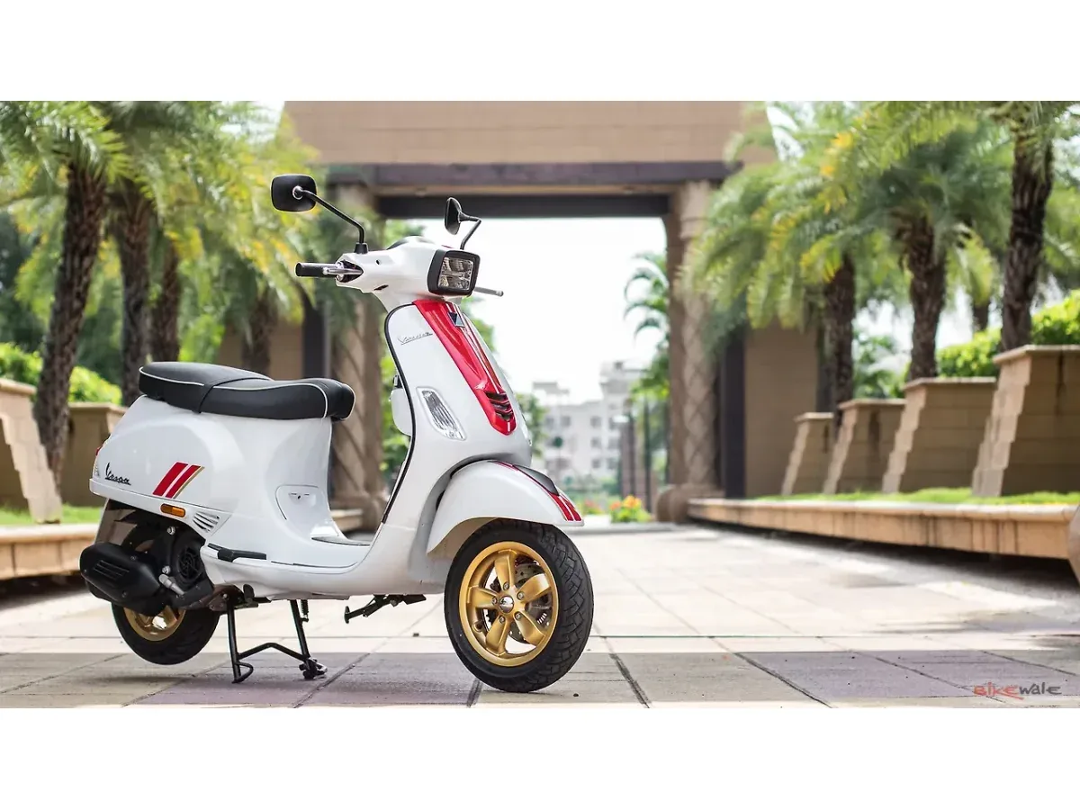 White Vespa SXL 150 shown from the front-right angle