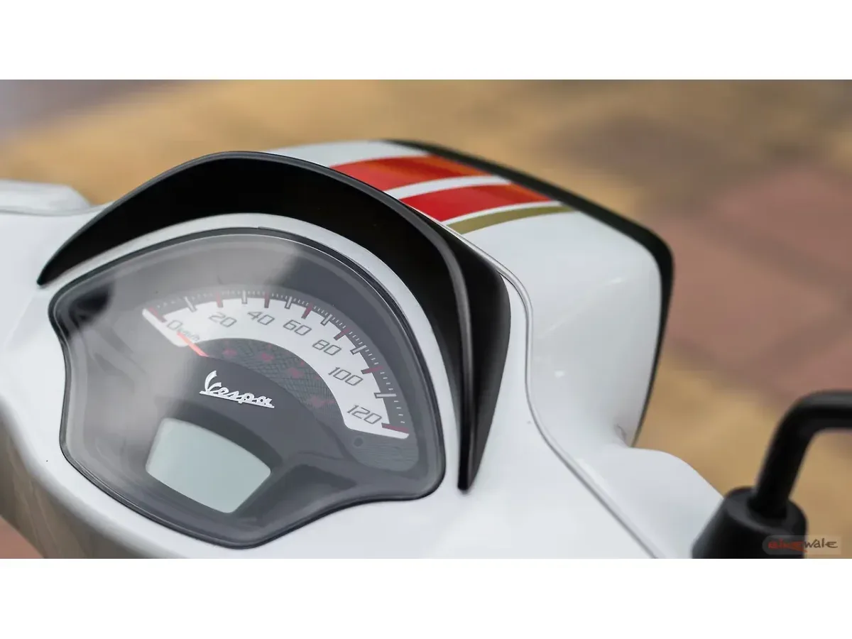 Close-up of the Vespa SXL 150 instrument panel and speedometer