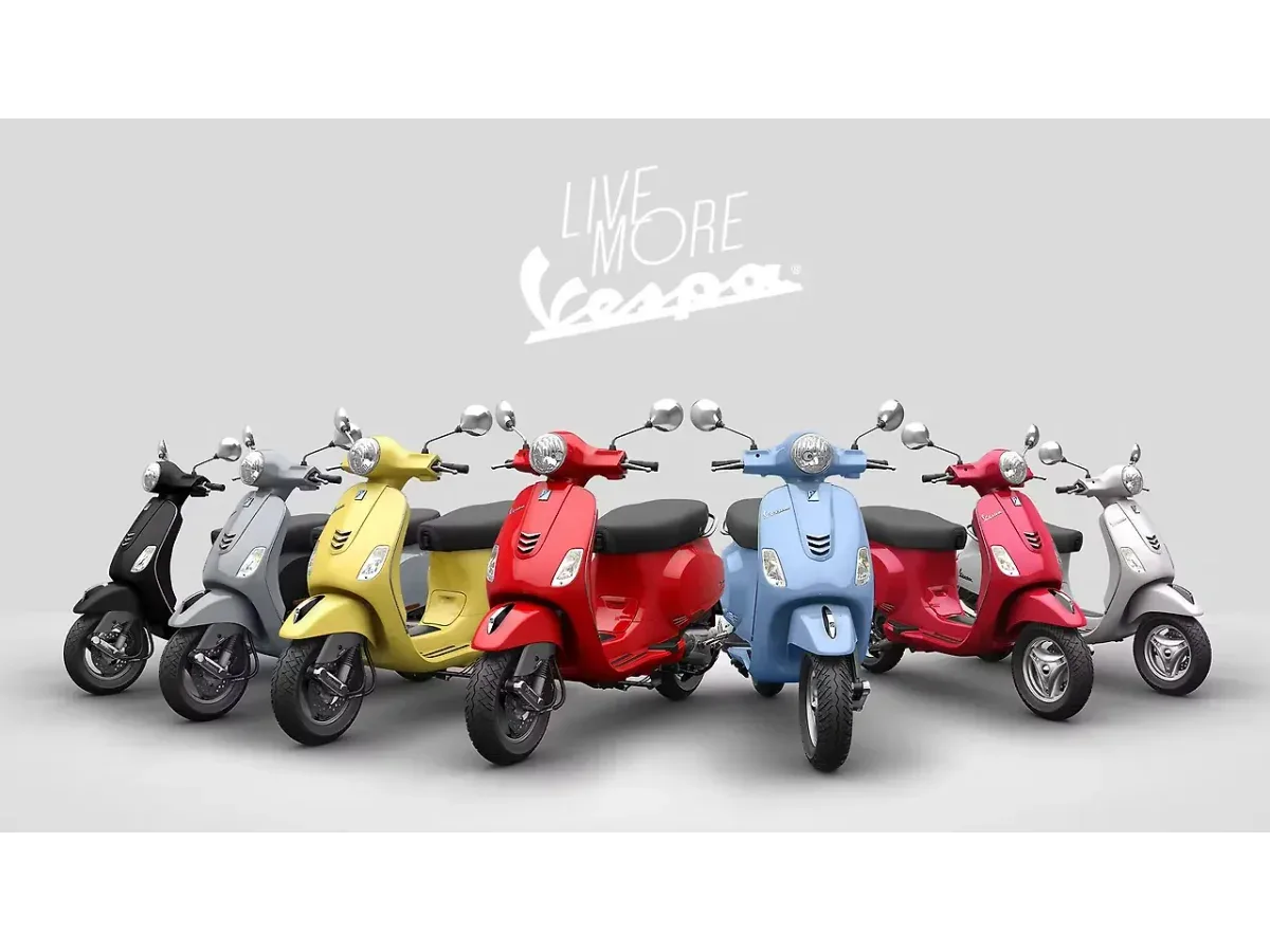 Right front three-quarter view of multiple Vespa VXL 125 scooters