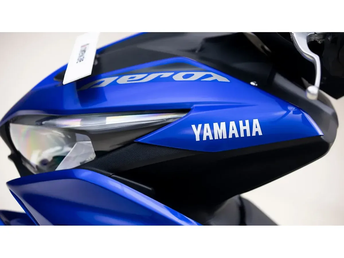 Yamaha Aerox 155 front panel with Aerox and Yamaha graphics