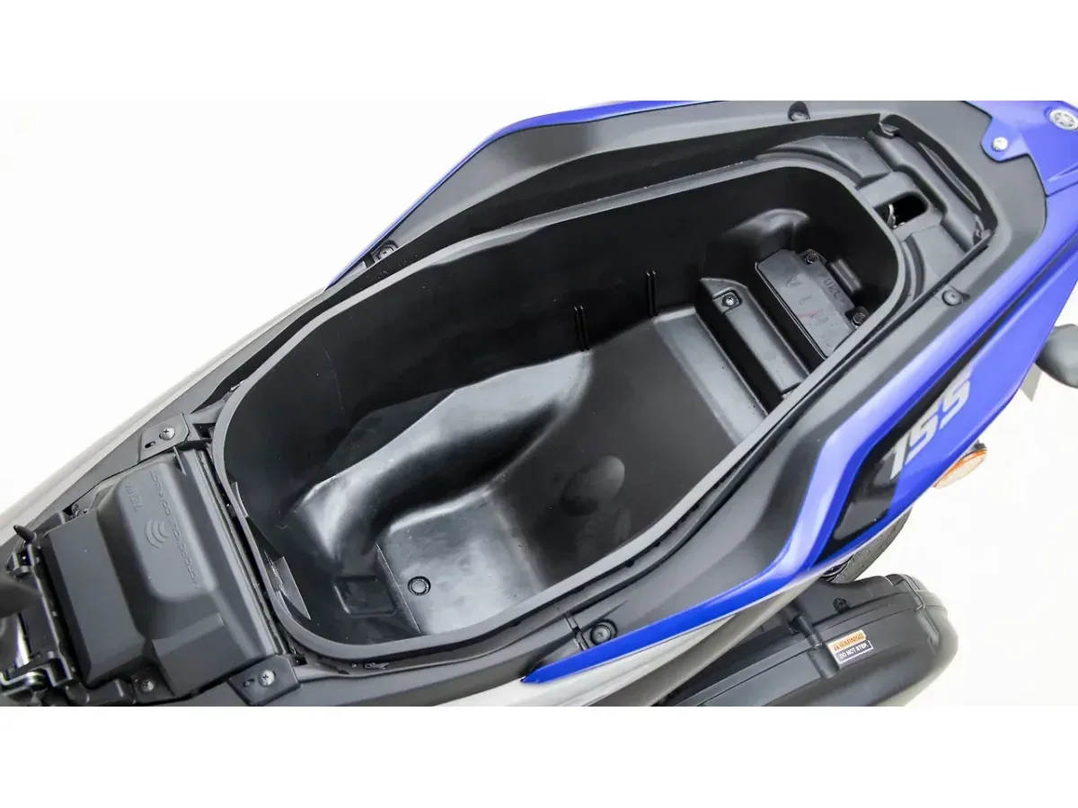 Underseat storage compartment of the Yamaha Aerox 155